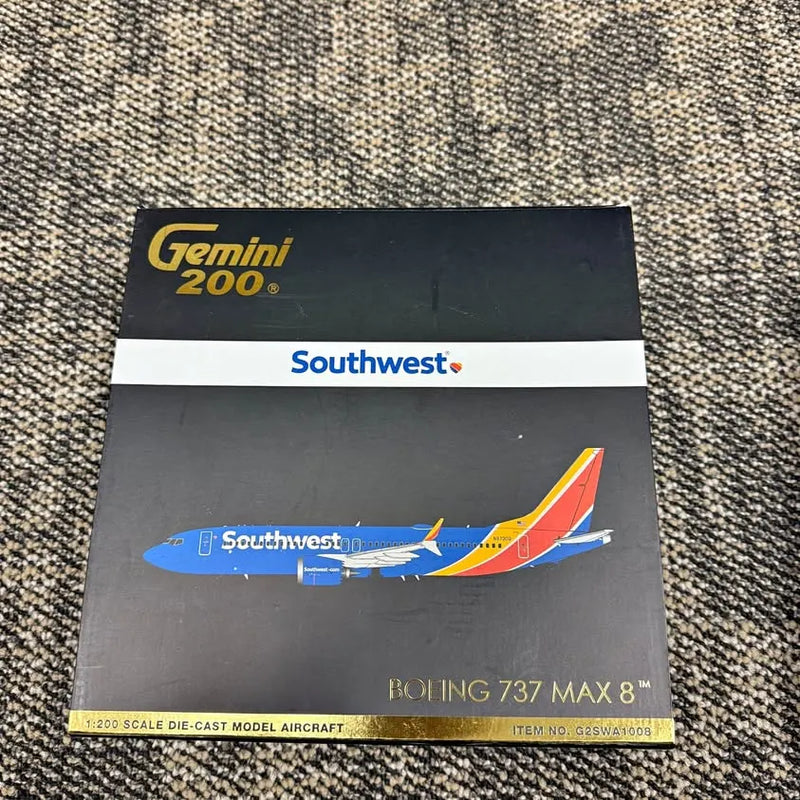 Southwest Boeing 737 MAX 8 diecast plane model, blue with yellow wing and red tail