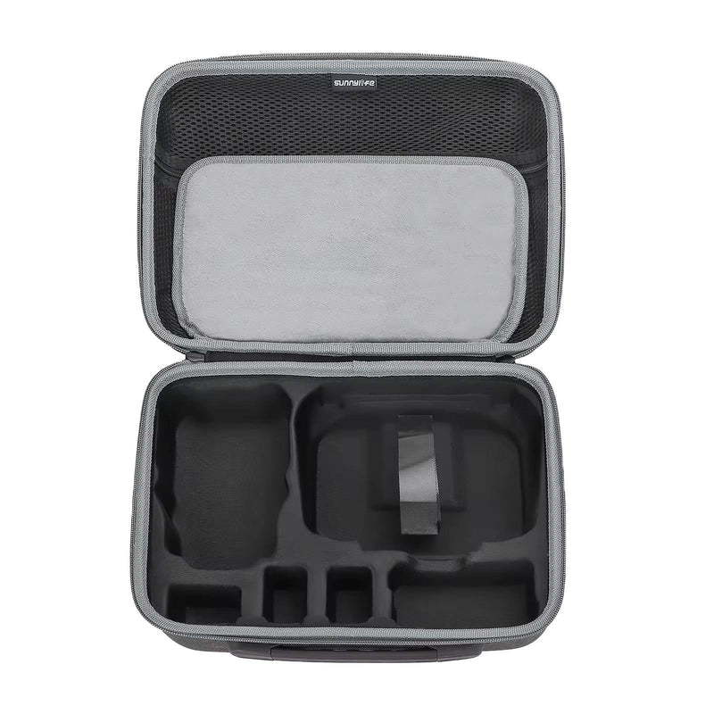 Hard travel drone carrying case with open top, foam compartments and mesh pocket