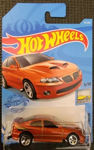 Hot Wheels 1:64 diecast car, copper-orange Pontiac GTO '06 in blister pack