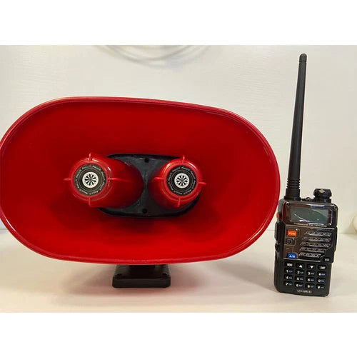 Red megaphone speaker with two audio drivers and handheld radio transmitter
