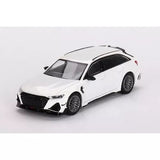 White diecast mini car with black grille and wheels, sleek sporty body.