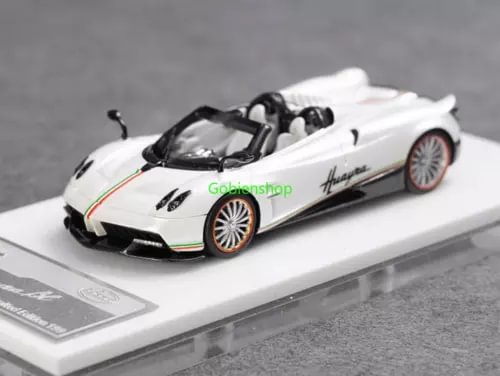 White convertible sports diecast car model with wheels and front hood detailing