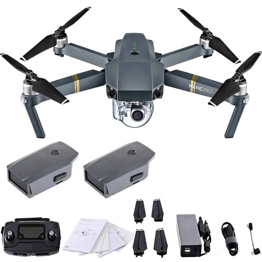 Drone kit with quadcopter, controller, batteries, charger, and landing covers