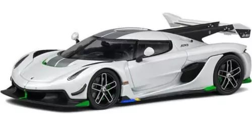 Pearl white diecast supercar model with black trim, green accents, rear wing