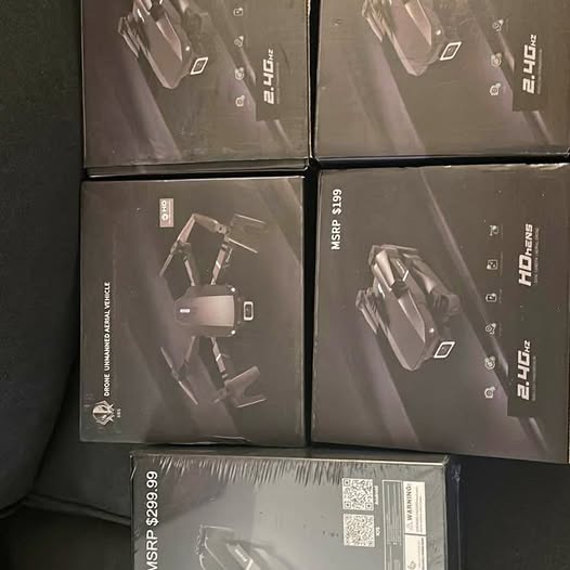 Drone packaging box set with fold-out drone graphic, dark gray and black