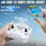 Mini remote-control quadcopter with handheld controller, white body and four propellers.