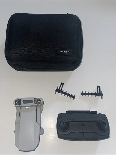 Camera drone with controller, prop guards, and protective case