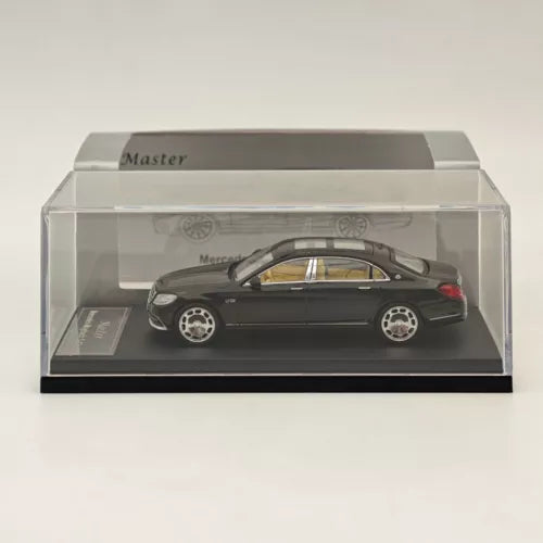 Black diecast sedan toy car model in clear display case, silver wheels