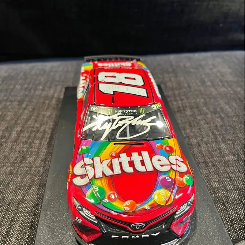 Autographed diecast race car, red with Skittles decals and signed windshield