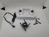 Foldable mini drone with four propellers, plus remote and charging cables