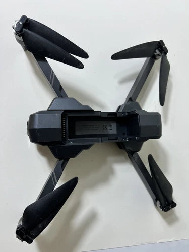 Gray quadcopter drone with 2-axis gimbal camera and four propellers