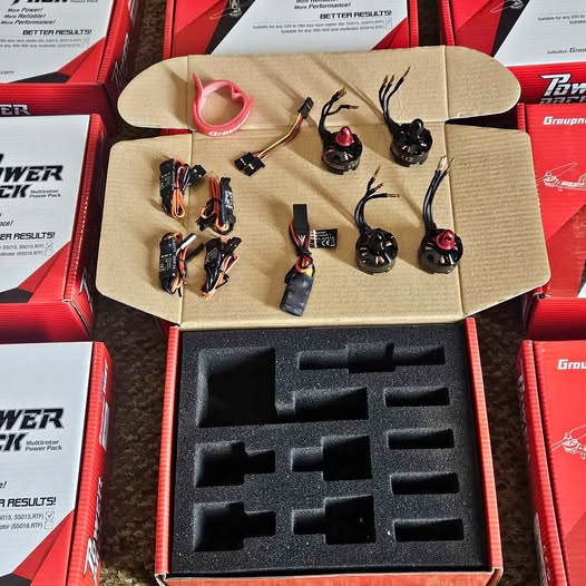 Quadcopter motor and ESC set with foam organizer tray and wiring connectors