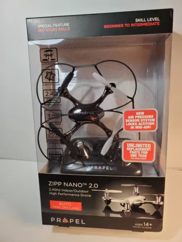 Black quadcopter drone with four rotors in retail package