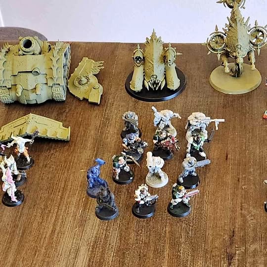 Painted sci-fi tabletop miniatures set with space marine figures and drones
