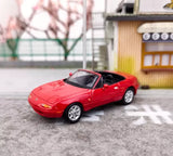 Red 1:64 JDM MX5 Miata diecast metal sports car toy, front three-quarter view