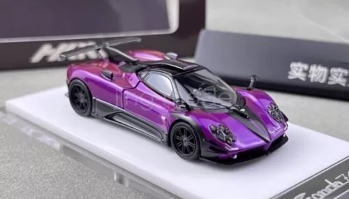 Purple 1:64 scale sports diecast car model with black details and open wheels