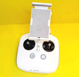 White DJI Phantom transmitter remote controller with phone holder