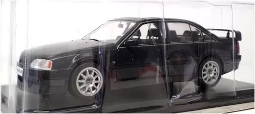 Graphite diecast model car, dark gray 1991 Opel Omega Evo 500 sedan, side view