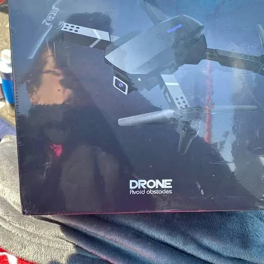 Drone obstacle-avoidance drone toy box with illustrated quadcopter and “Avoid obstacles” text