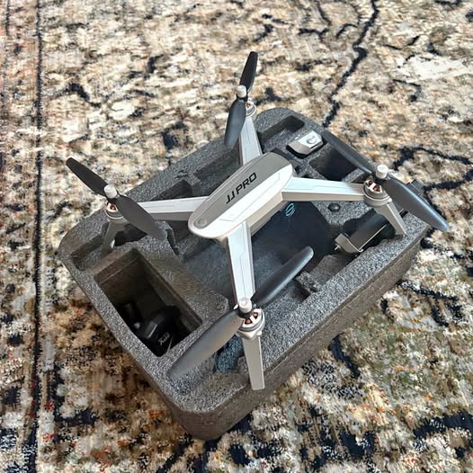 JJR/C quadcopter drone in foam carry case with folded propellers