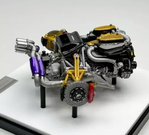 1:18 diecast metal engine display model with exposed black, yellow, and purple parts