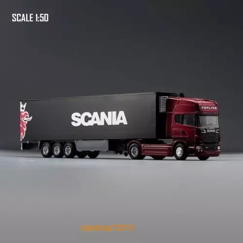 Diecast metal tractor-trailer truck model with red cab and gray Scania trailer