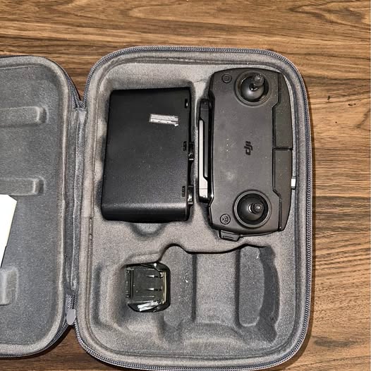 Hard-shell drone accessory case with controller, drone, and battery