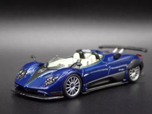 Blue and silver diecast sports car model with detailed wheels and front grille
