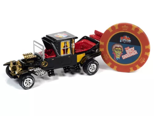 1:64 diecast car toy with round collector token, black and red