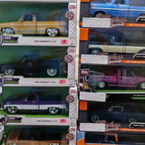 1:24 scale diecast truck set in retail boxes