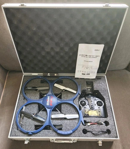 Blue RC camera drone with prop guards in open hard case, controller and parts.