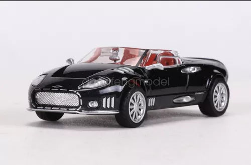 1/64 scale black diecast sports car model, front view with headlights