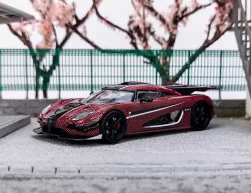 Red 1:64 Agera One sports racing diecast model car, front 3/4 view