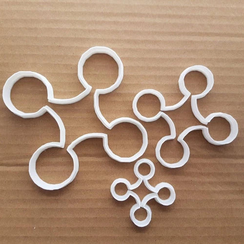 Drone-shaped cookie cutter set, white plastic outlines and propeller details