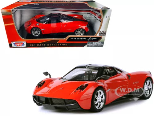 Die-cast PAGANI HUAYRA model car, bright red with chrome wheels and black accents