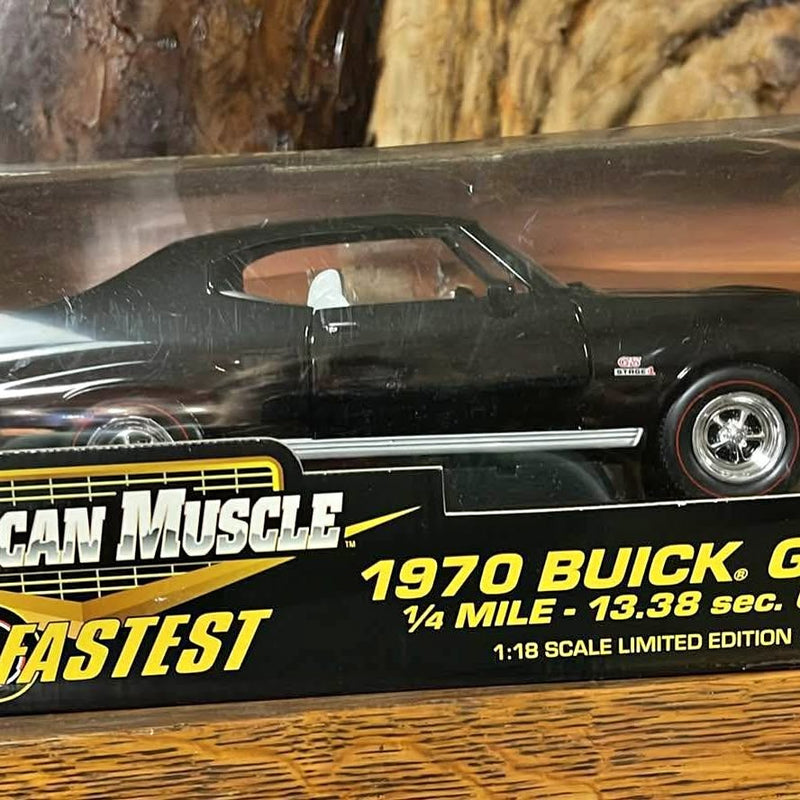 1:18 scale diecast racing car, dark green with CAM MUSCLE FASTEST decals