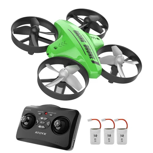 Green mini quadcopter drone with controller and three battery packs