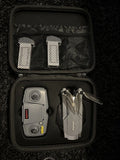 Syma X500Pro gray GPS drone with prop guards in hard case