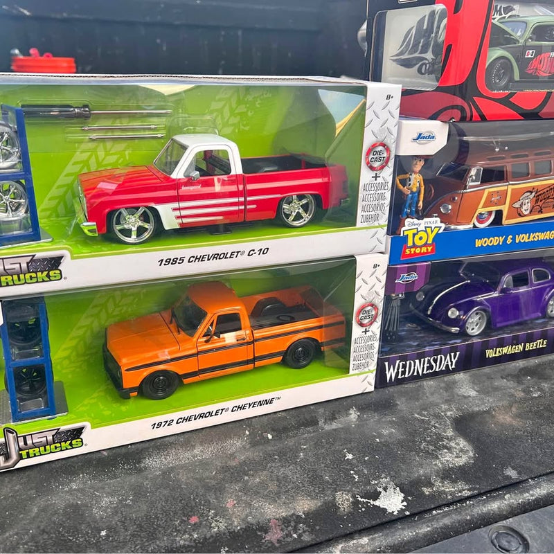 Die-cast Chevrolet C-10 truck model in box, red and white, chrome wheels