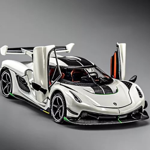 White 1:24 diecast supercar model with open doors and black front splitter details