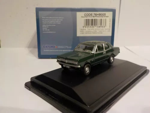 Green Vauxhall Viva diecast model car on black display base, front three-quarter view