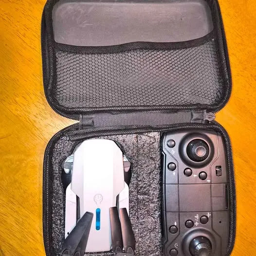 Drone and remote controller in open hard zip case
