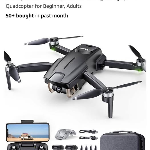 Foldable quadcopter drone with four propellers, controller and carrying case