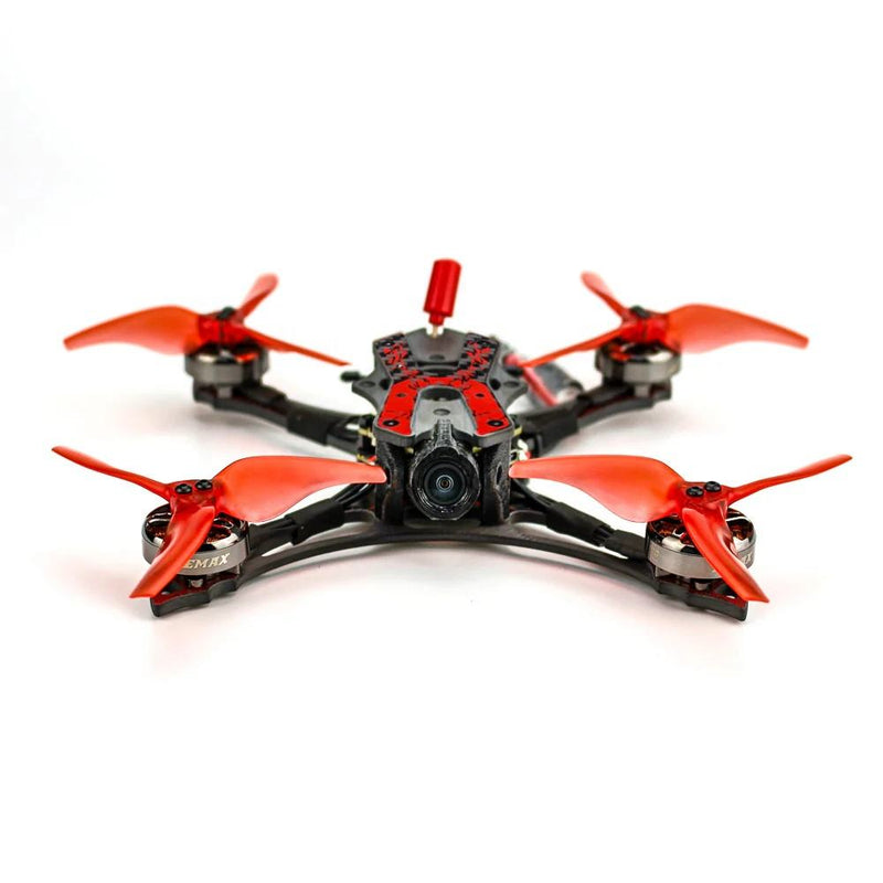 Red and black quadcopter racing drone with FPV camera and four propellers