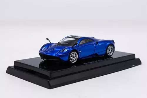 Pagani Huayra blue diecast sports car model on black display base