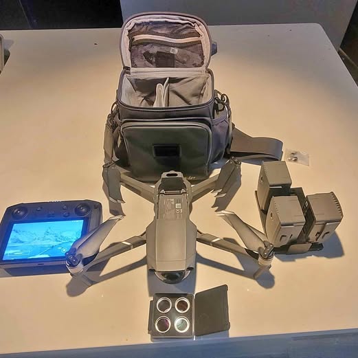 Dji Mavic Zoom 2 drone with open storage case, remote controller and screen