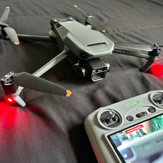 Gray DJI Mavic 3 drone with front camera and foldable propeller arms