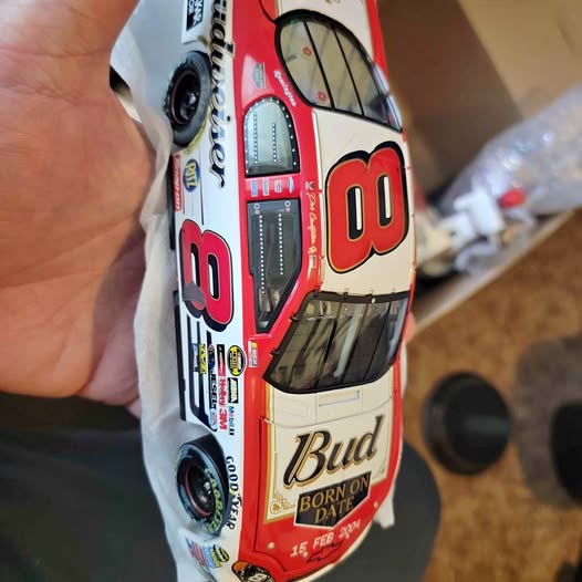 Red and white race car diecast with Bud and number 8 decals