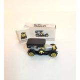 1:64 vintage diecast model car, black with gold details, with display box
