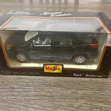 Die-cast SUV toy car in display box, dark color, Special Edition, Maisto logo